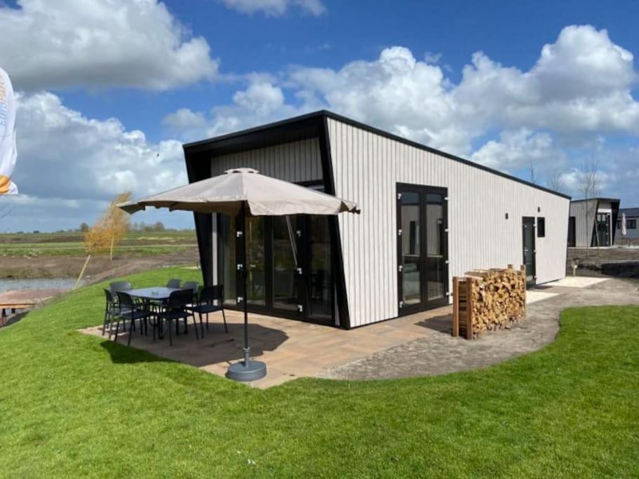 Tiny Vakantiehuis Aan Het Water Met Eigen Steiger En Airco Kampen Exterior foto